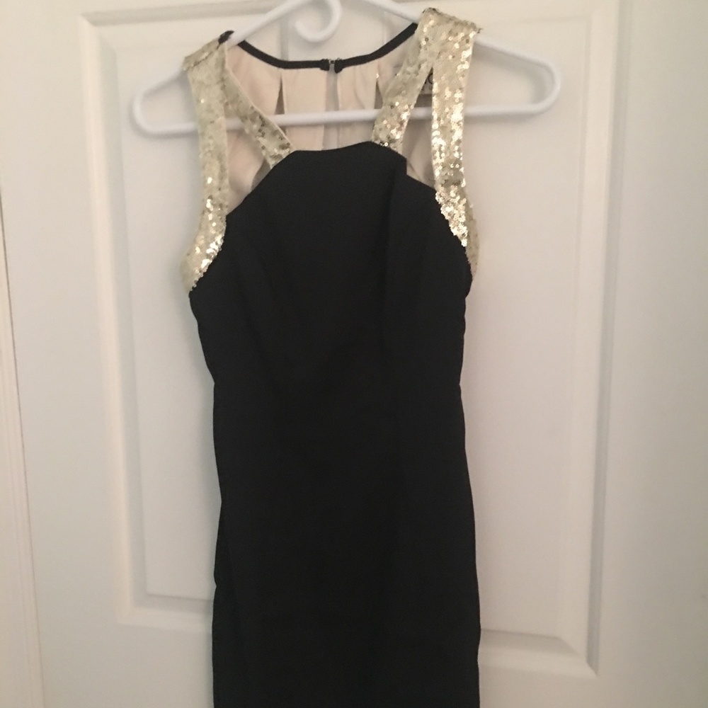 xenia black and gold mini dress